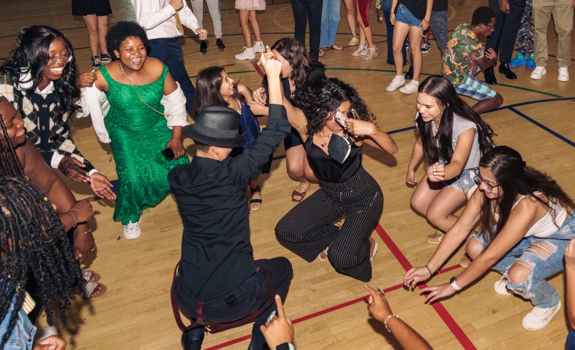 Students dancing in MAC gym during Monte Carlo at the Campus Recreation Center